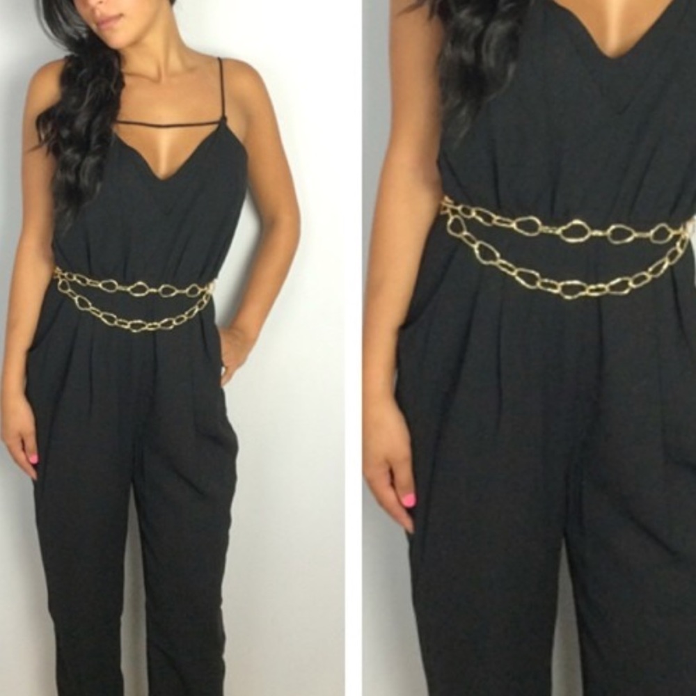 Black skinny leg jumpsuit. Belt not included